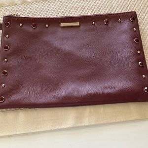 New York and Co. Faux Leather Studded Wristlet in Burgundy
